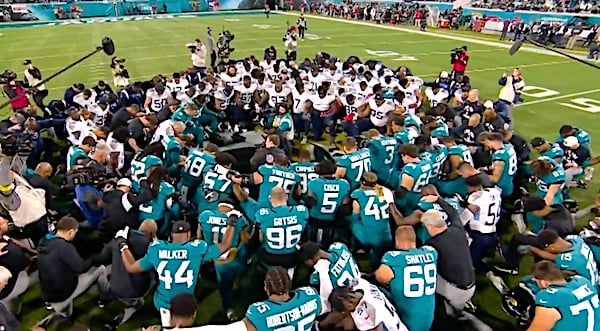 NFL players from the Jacksonville Jaguars and Tennessee Titans pray for Damar Hamlin before their game on Saturday, Jan. 7, 2023. (Video screenshot)