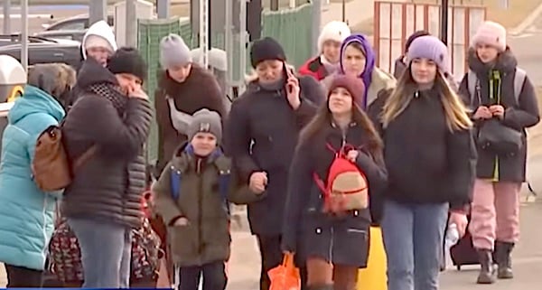 Ukrainian refugees flee their homeland in March 2022 after Russia's invasion. (Video screenshot)